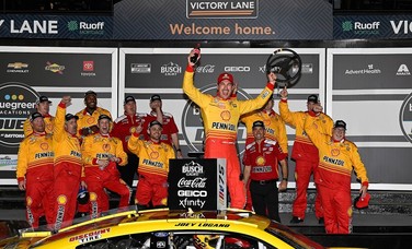 Logano and No. 22 Ford team celebrate their win the Daytona 500 qualifying race to start 2023.